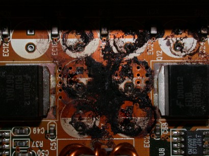Motherboard covered in Black Stuff